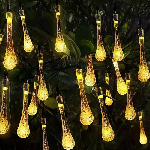 GUIRNALDA SOLAR LED 30 GOTAS LUZ CÁLIDA AMARILLA 6,5 METROS IP65 PARA EXTERIOR