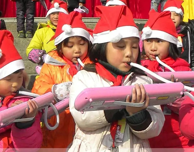 PIANO DE AIRE COMPRIMIDO 32 TECLAS ROSA PARA NIÑOS CON BOLSA DE TRANSPORTE
